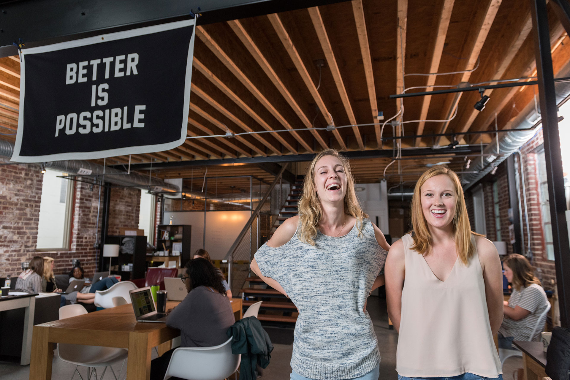 Portrait of the two founders of Drinkably with a banner that says Better is Possible