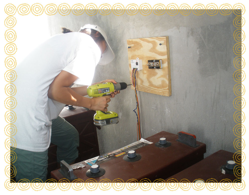 A student installs wiring