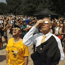 President Peterson views the eclipse