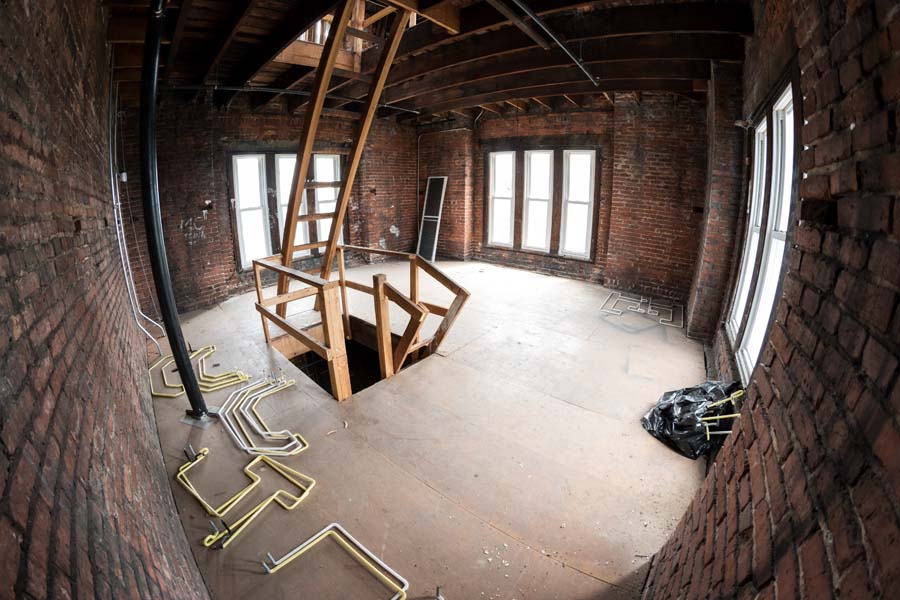 The second level of the Tower, with windows on three sides, is a holding area for replacement parts for the Tower’s neon letters.