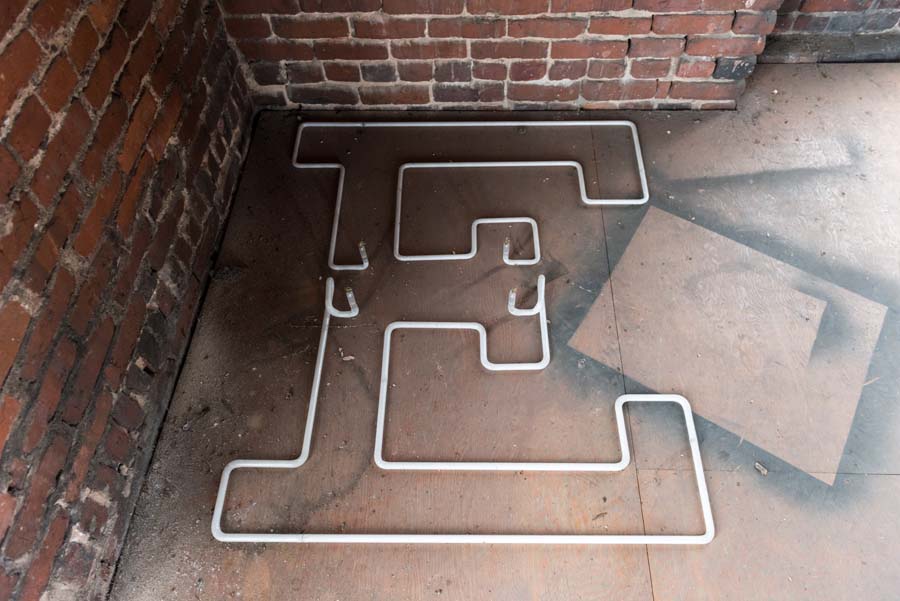 The letters T-E-C-H have been outlined in neon since the 1950s.