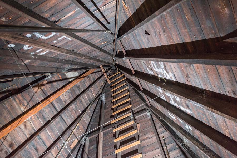 A ladder attached to the wall leads to the top of the inside of the Tower’s finial.