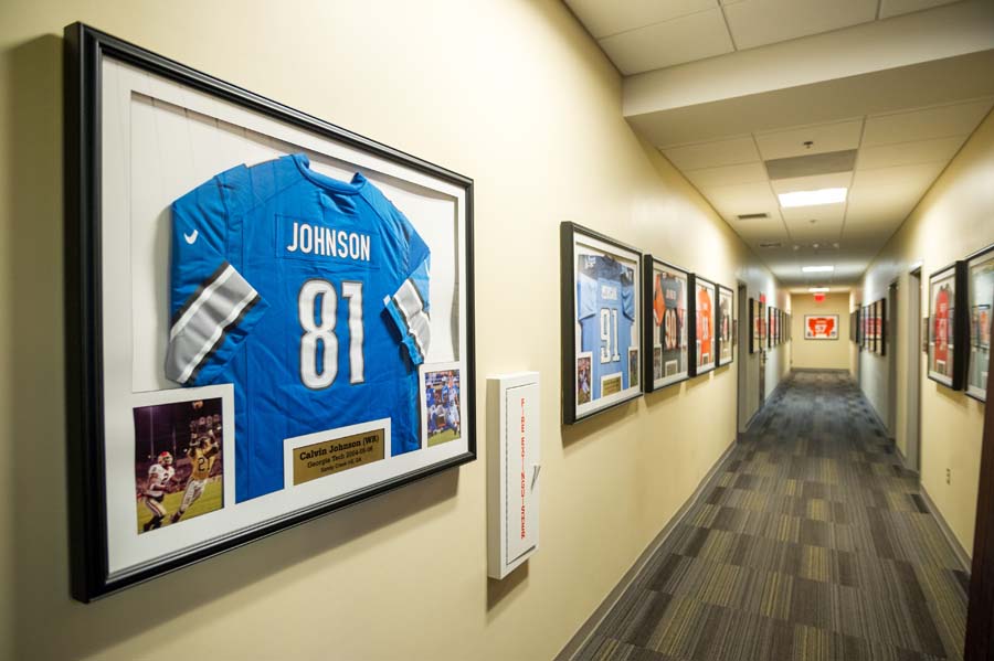 The NFL Hallway includes jerseys and photos of Tech student-athletes who played in the NFL, such as Calvin Johnson who was drafted by the Detroit Lions in 2007.