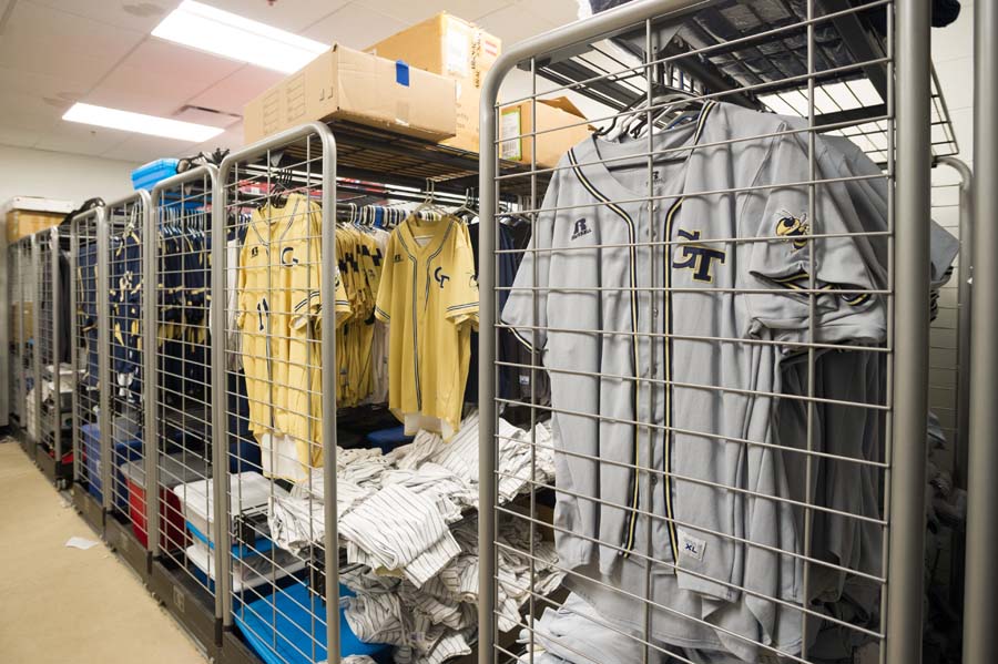 Uniforms in the baseball equipment room.