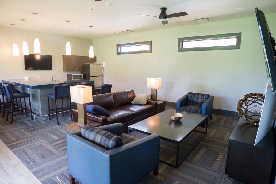 Golf team lounge inside the Stewart and Lisa Cink Clubhouse at Noonan Golf Facility.