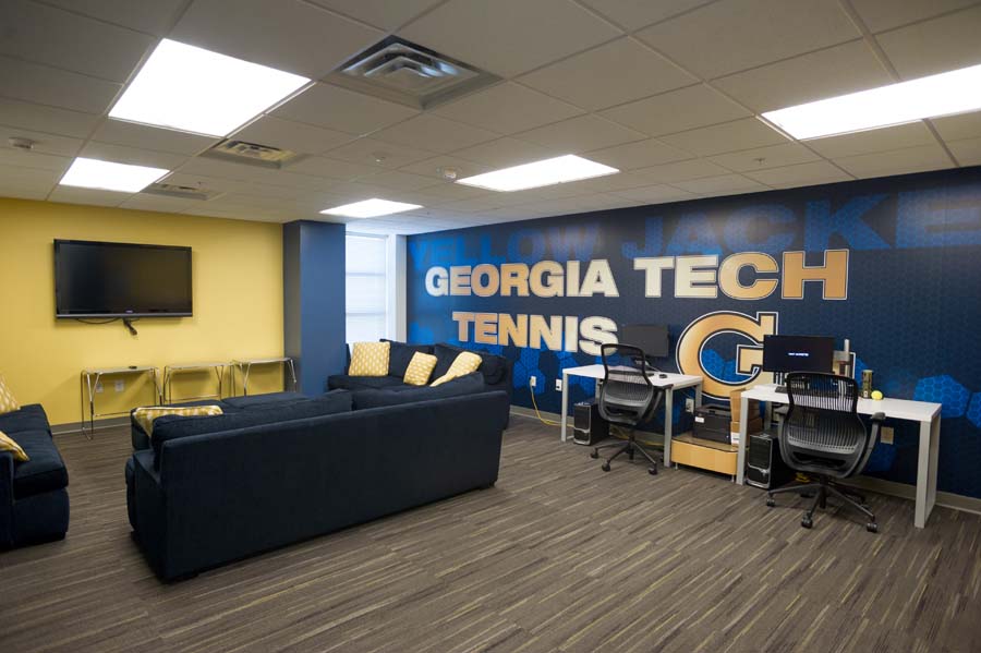 Tennis players lounge at the Ken Byers Tennis Complex.