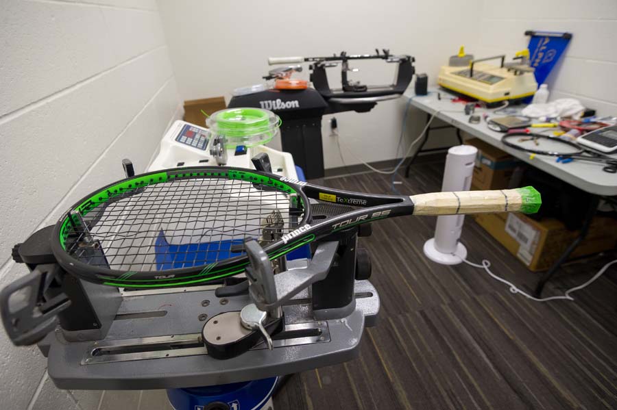 Tennis racket stringing machine.