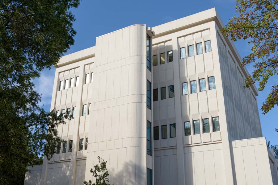 The Jesse W. Mason Building has precast window panels, with the balance being traditional cast-in-place. The entire building, including the stair tower in front, is covered with painted stucco.