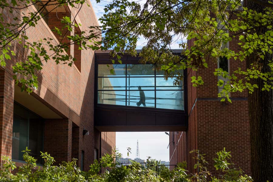 A skywalk bridge connects the Van Leer Building and the Pettit Microelectronics Research Center. The Biltmore tower is visible in the distance.