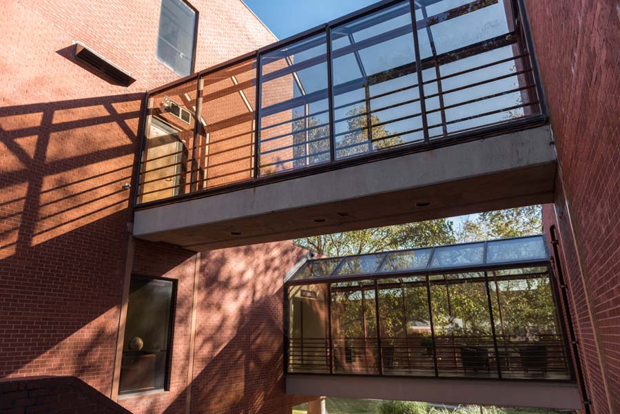 Glass-enclosed walkways connect the Groseclose Building and the Main Industrial and Systems Engineering Building.