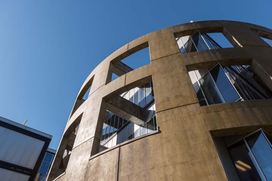 Monumental cylinders recall industrial oil drums at the second Lord Aeck and Sargent building at the Manufacturing Related Disciplines Complex.