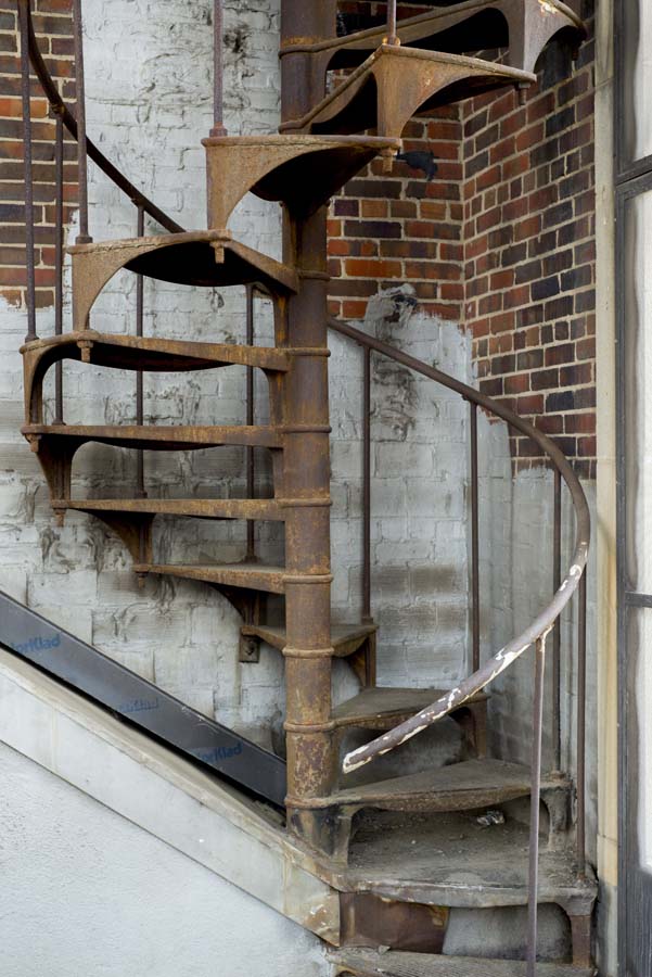 A spiral staircase in the corner leads to the roof. Hidden Georgia Tech Daisy's Apartment