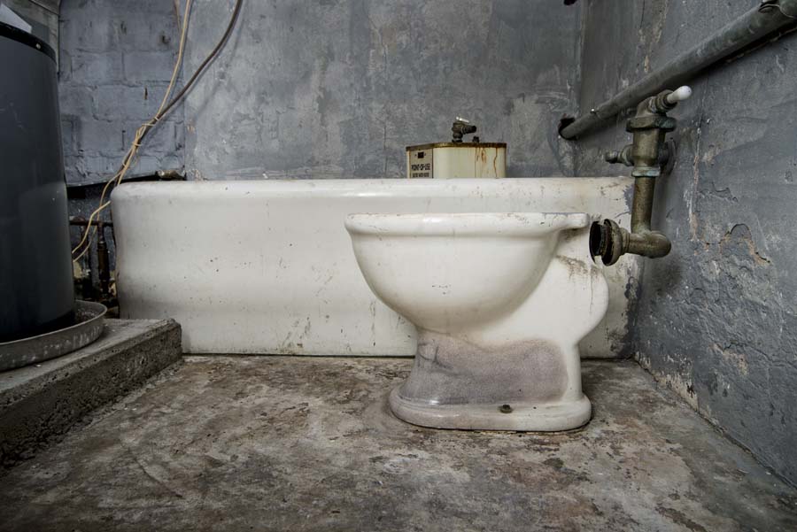 The bathroom of the empty apartment now accommodates part of the building’s HVAC system. Hidden Georgia Tech Daisy's Apartment