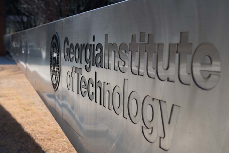 The Georgia Institute of Technology sign on the lawn of the Scheller College of Business is made of stainless steel.