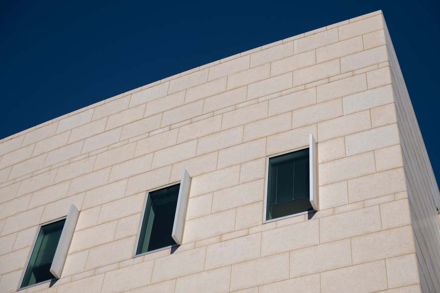 A section of the Molecular Science and Engineering Building is made of limestone.