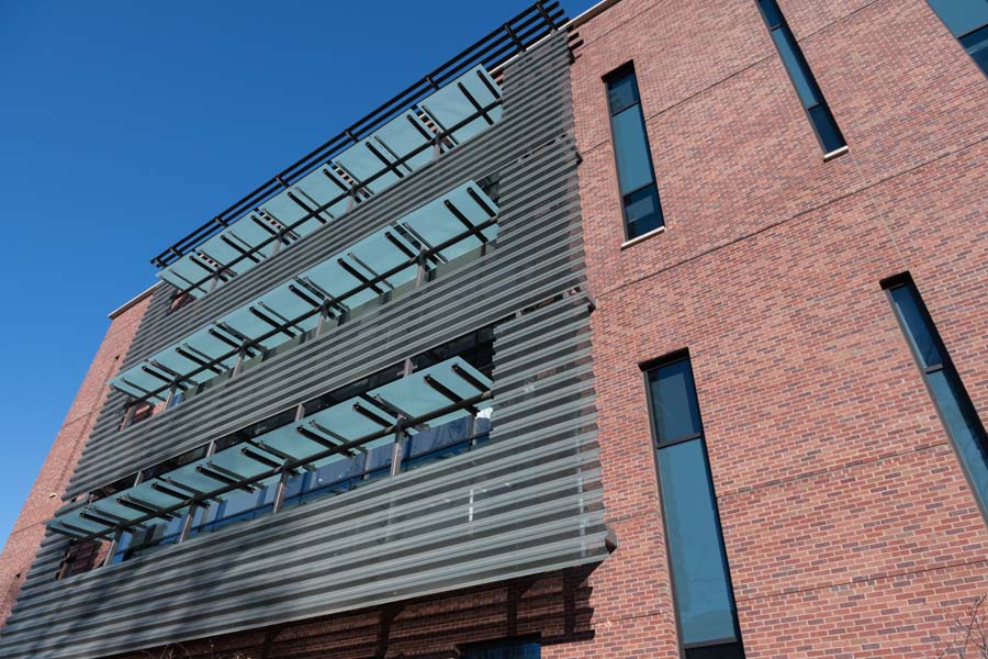 A wall constructed of mixed materials at the Krone Engineered Biosystems Building.