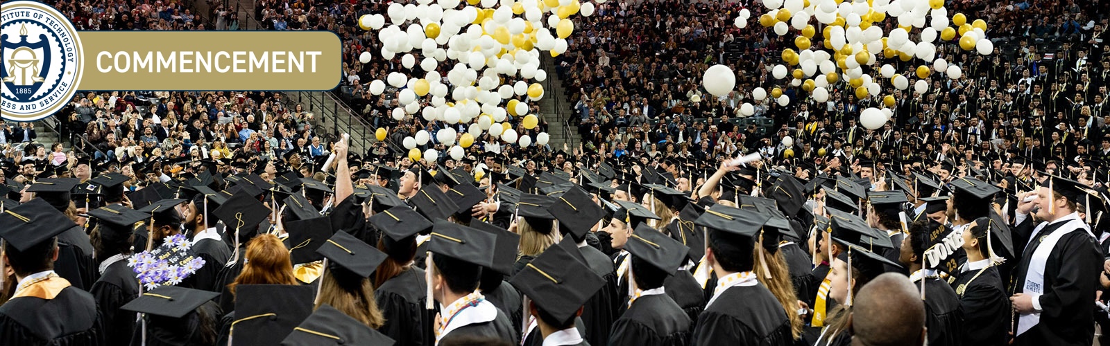 Balloons fall at commencement's end. 