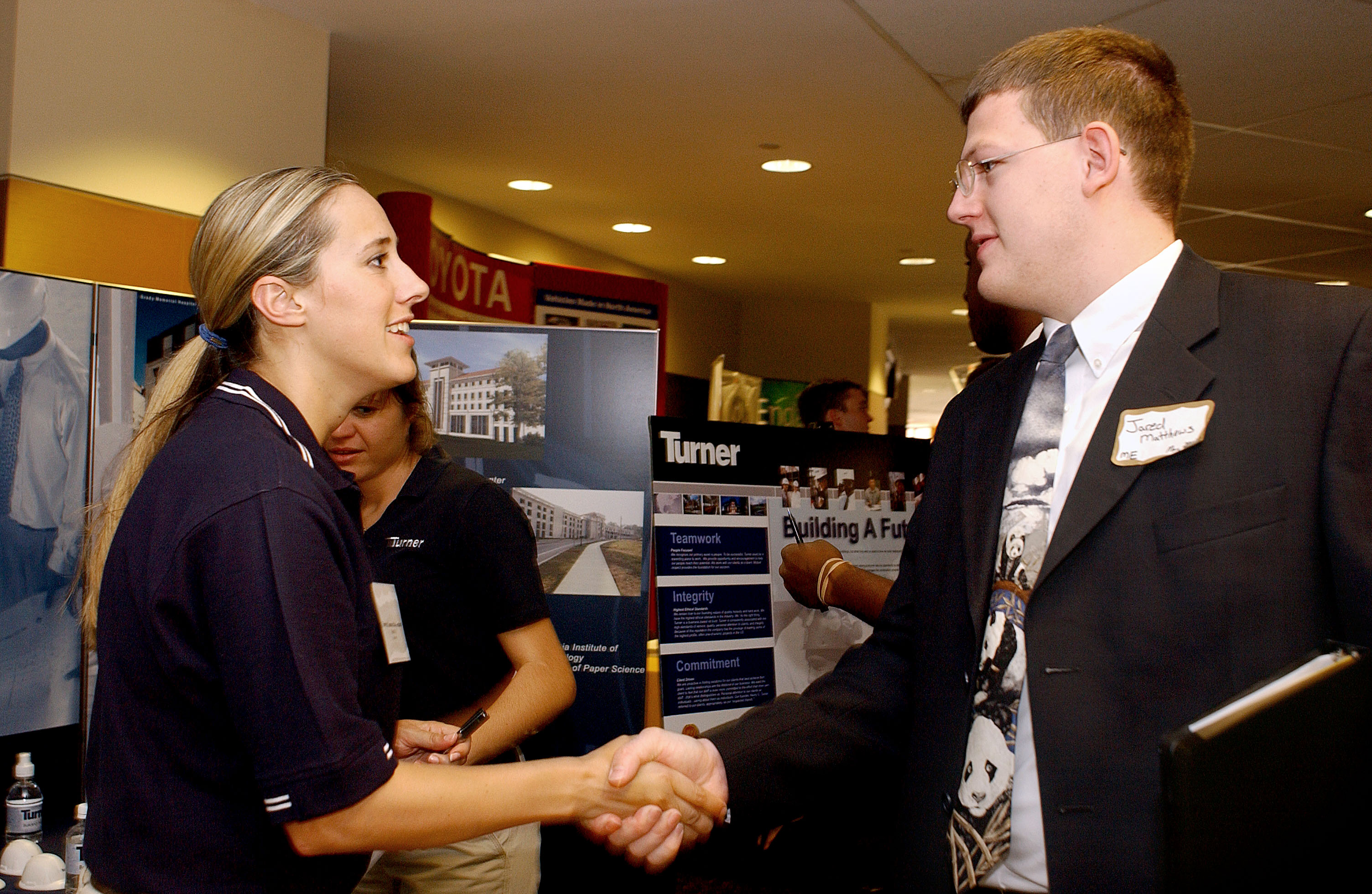 Well-prepared student interacts with a recruiter at the Georgia Tech Career Fair. Well-prepared student interacts with a recruiter at the Georgia Tech Career Fair.