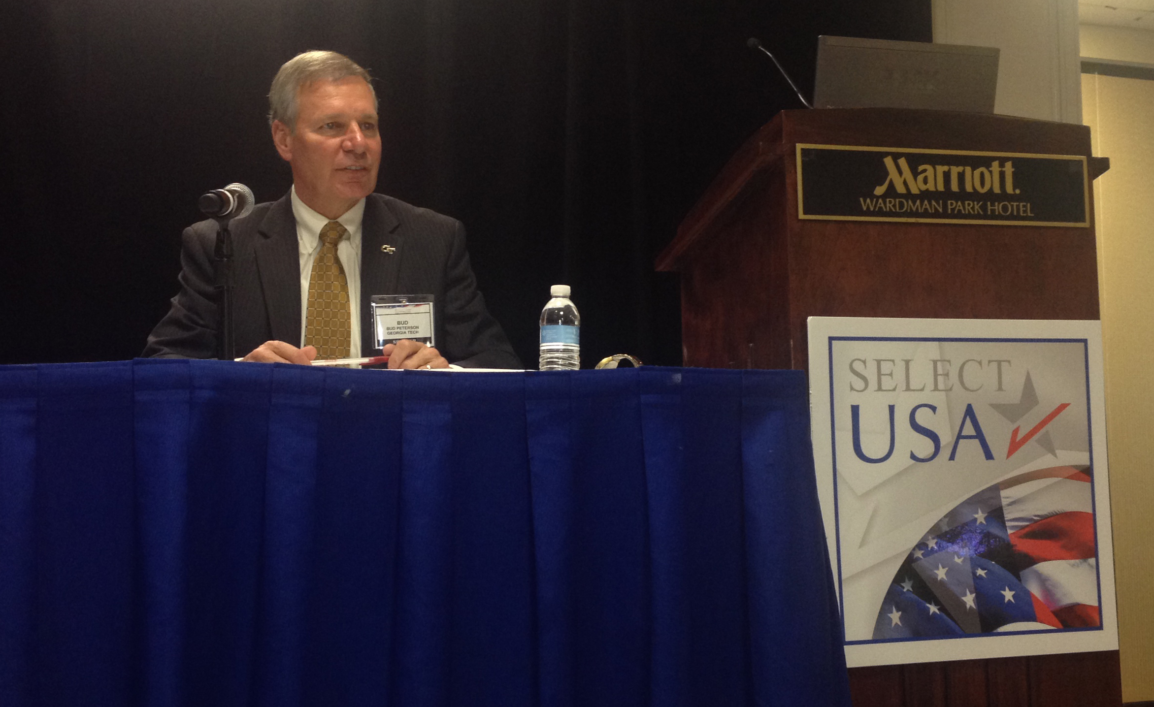 Georgia Tech President G.P. "Bud" Peterson moderates a panel at the Select USA Investment Summit in Washington DC on October 31, 2013.