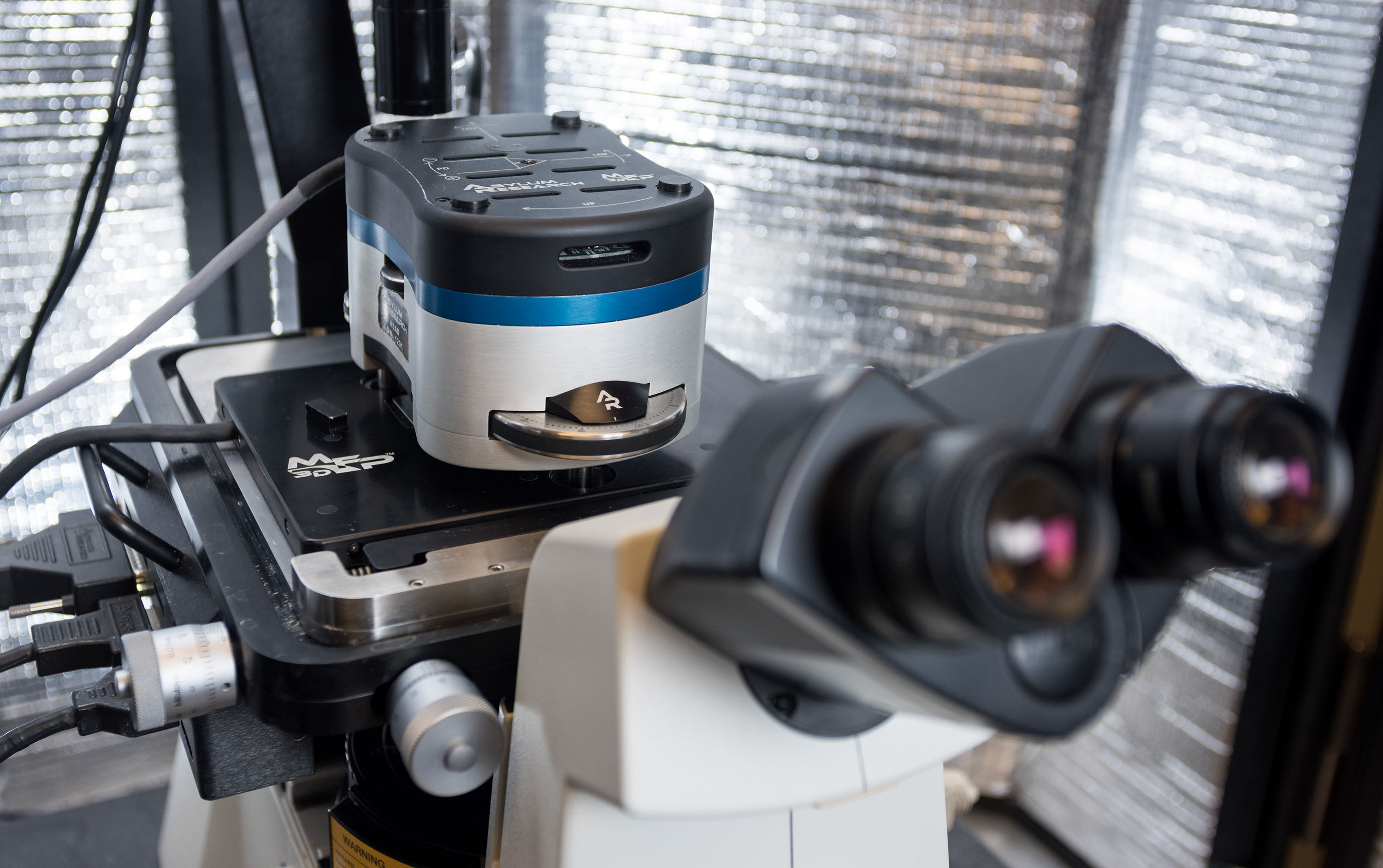 An atomic force microscope allows scientists to observe molecular interactions important to understanding life processes. Georgia Tech mechanical engineers focusing on biotechnology recently significantly improved AFM's sensitivity by adding electronic white noise. Credit: Georgia Tech / Rob Felt An atomic force microscope allows scientists to observe molecular interactions important to understanding life processes. Georgia Tech mechanical engineers focusing on biotechnology recently significantly improved AFM's sensitivity by adding electronic white noise. Credit: Georgia Tech / Rob Felt