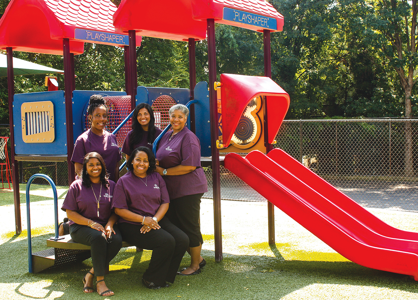 Lawrence (front left) and Watson-Grier (front right), along with the rest of their team, serve children and families of the Tech community through two on-campus child care facilities.