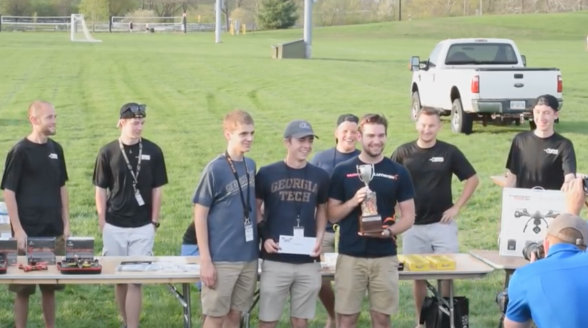 Seth Ableidinger, Davis Engleman, and Nick Willard bring home the first place trophy at the first-ever Collegiate Drone Racing National Championship held at Purdue University.