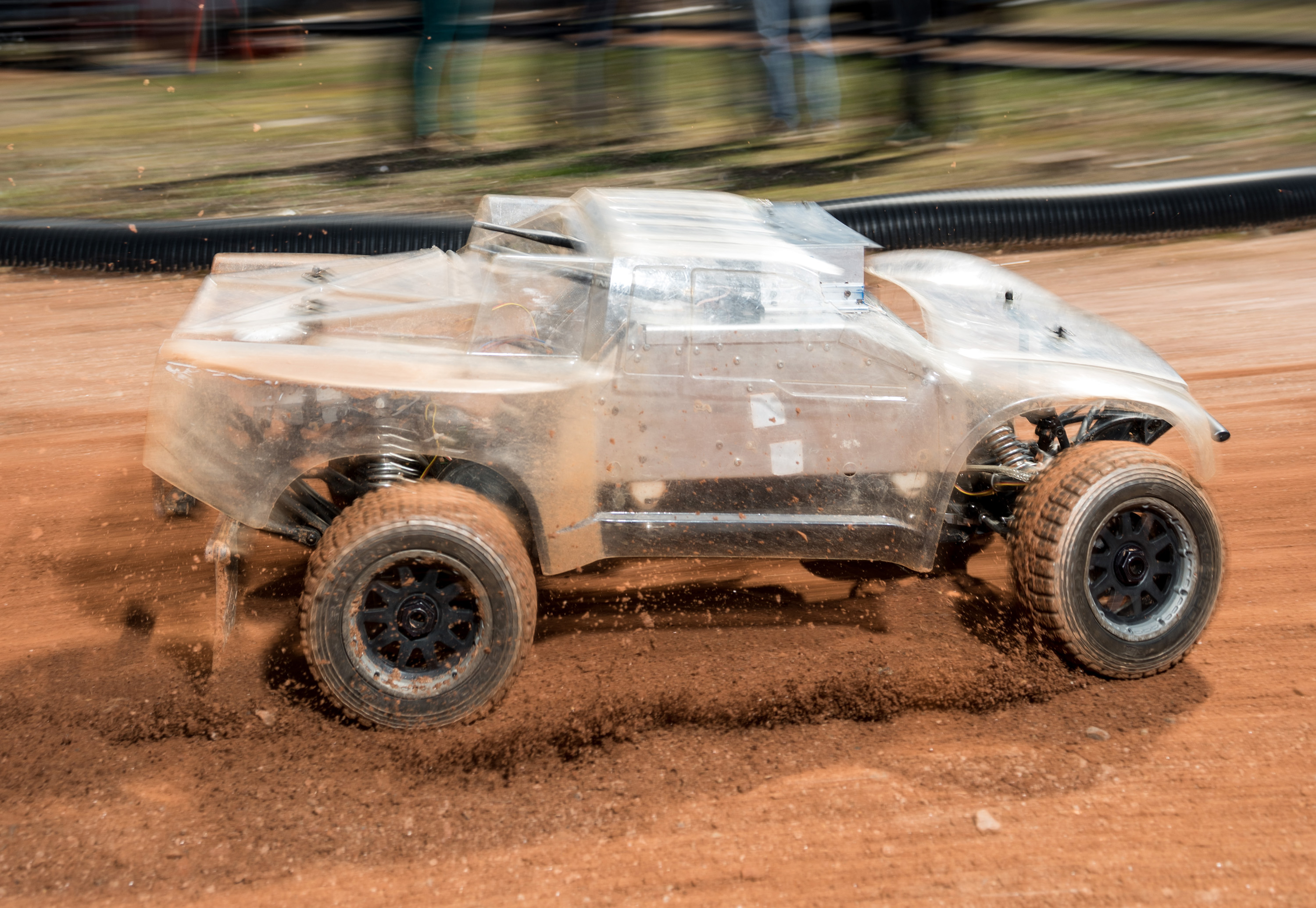 At the Georgia Tech Autonomous Racing Facility, researchers are studying a one-fifth-scale autonomous vehicle as it traverses a dirt track. The work will help the engineers understand how to help driverless vehicles face the risky and unusual road conditions of the real world. (Credit: Rob Felt, Georgia Tech) At the Georgia Tech Autonomous Racing Facility, researchers are studying a one-fifth-scale autonomous vehicle as it traverses a dirt track. The work will help the engineers understand how to help driverless vehicles face the risky and unusual road conditions of the real world. (Credit: Rob Felt, Georgia Tech)