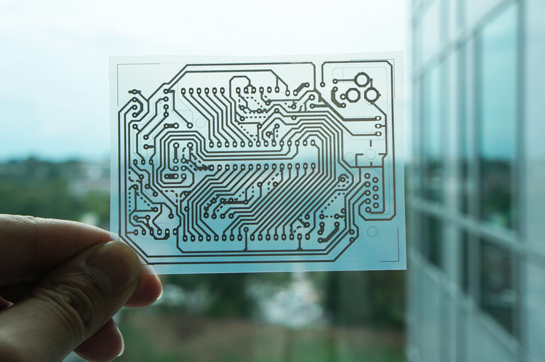 A single-sided wiring pattern for an Arduino micro controller was printed on a transparent sheet of coated PET film. A single-sided wiring pattern for an Arduino micro controller was printed on a transparent sheet of coated PET film.