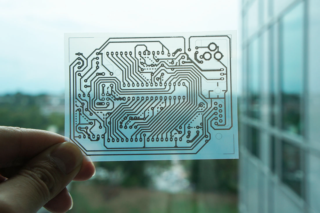 A single-sided wiring pattern for an Arduino micro controller was printed on a transparent sheet of coated PET film.