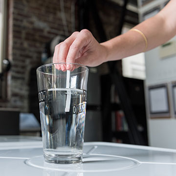 The Drinkably water-testing solution is as simple as dipping a strip into a sample of water.
