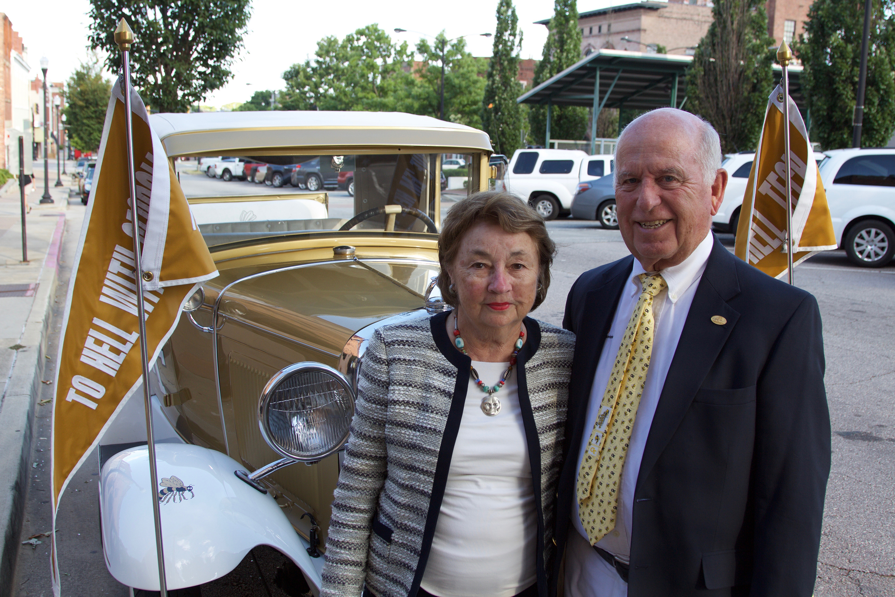 Macon architect Eugene Dunwoody Sr., Georgia Tech class of 1955, and his wife, Susan, pose with the famous Ramblin’ Wreck outside the Blacksmith Shop in downtown Macon June 20 during a Georgia Tech alumni reception.