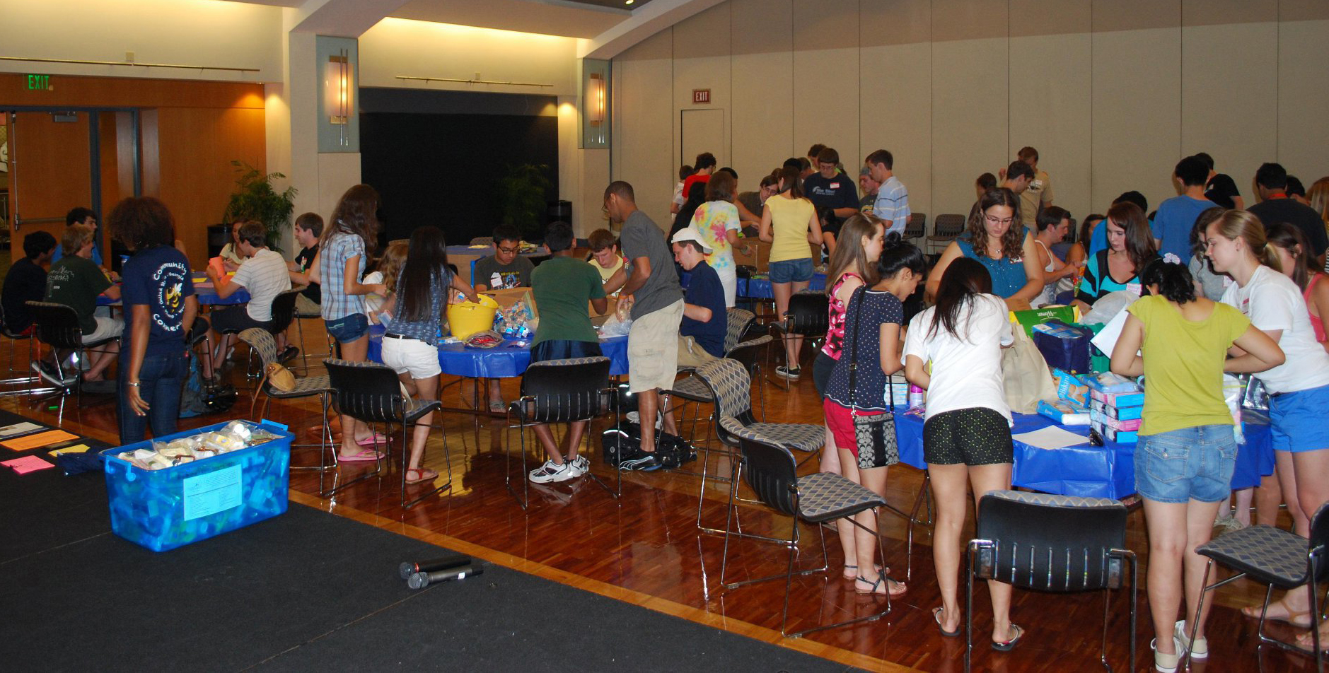 Students gather in the Student Center for the Small Act Big Impact packaging event in 2013.
