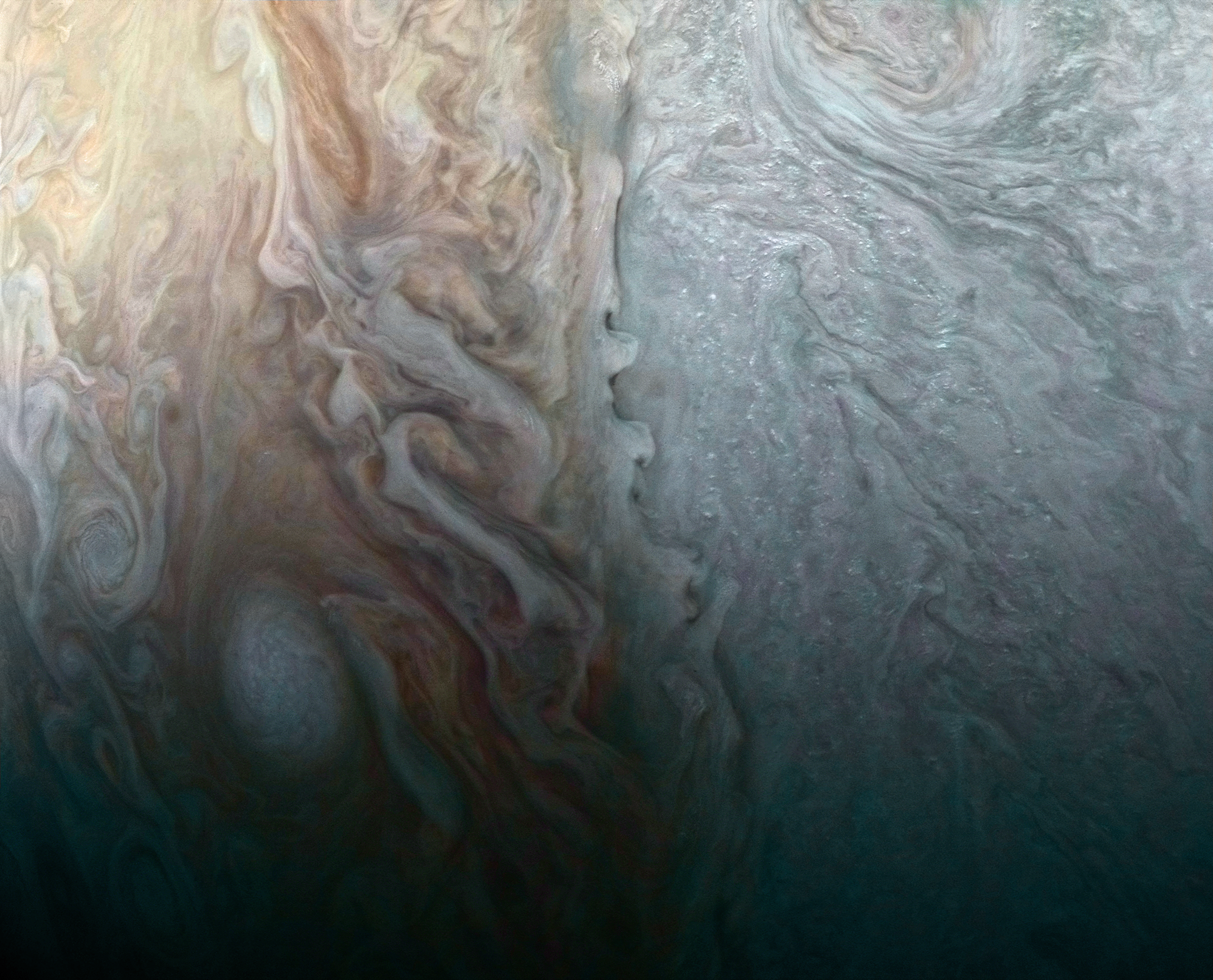 This image, taken by the JunoCam imager on NASA’s Juno spacecraft, highlights a feature on Jupiter where multiple atmospheric conditions appear to collide. Photo credits: NASA/JPL-Caltech/SwRI/MSSS/Roman Tkachenko