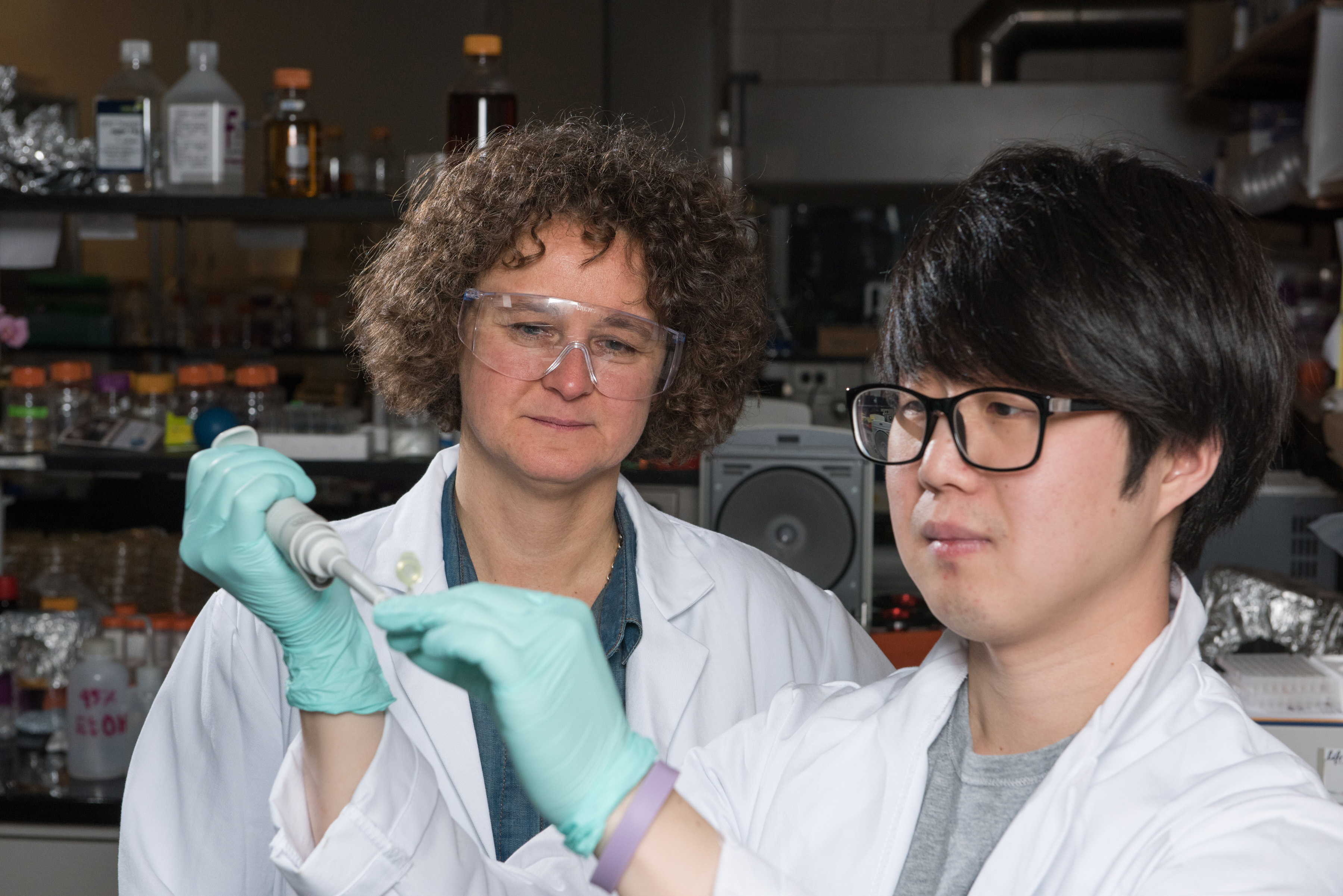 Georgia Tech Associate Professor Francesca Storici (left), Graduate Student Kyung Duk Koh and collaborators have developed and tested ribose-seq, a technique for identifying ribonucleotides in genomic DNA. (Credit: Rob Felt)