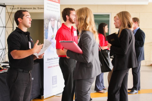 Students talk with a recruiter at the annual Career Fair. 