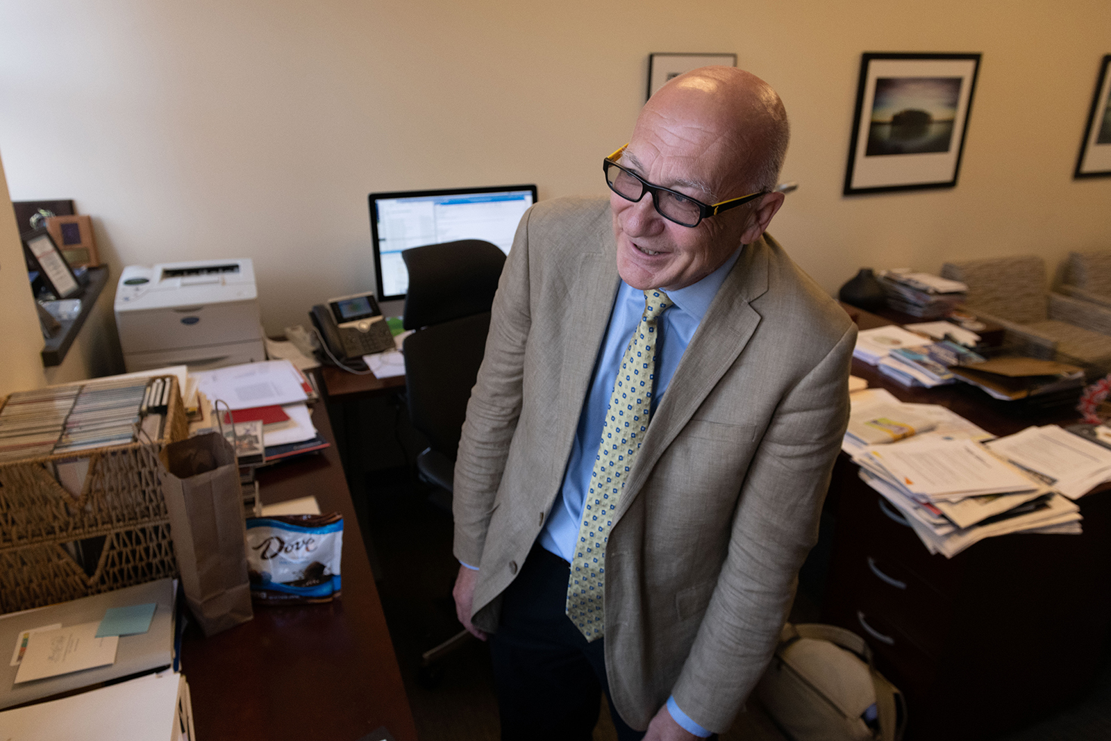 Colin Potts looks at the steam whistle from his office window