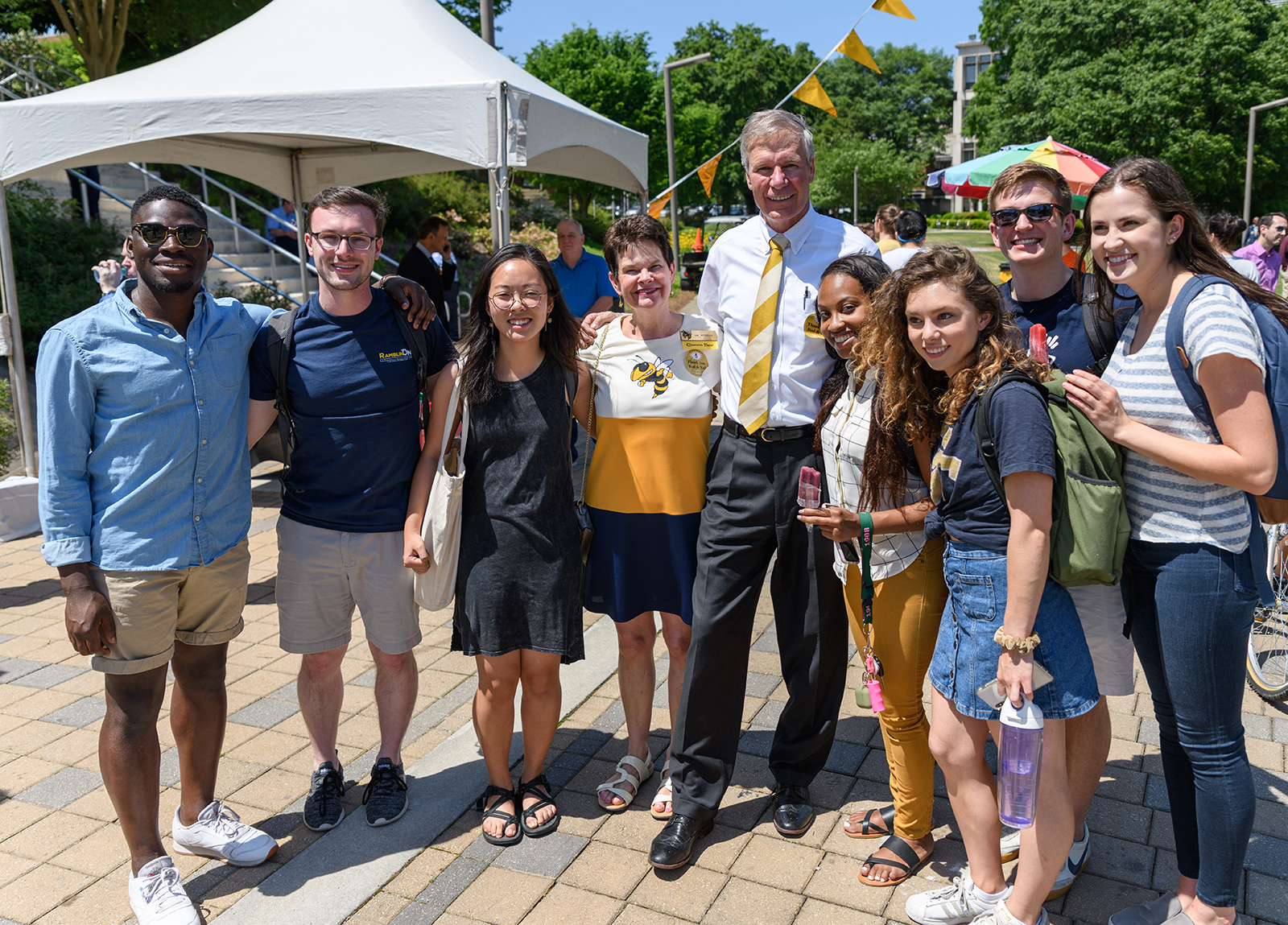 president and val with students