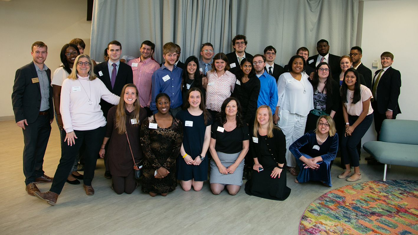 excel students participate in a networking event