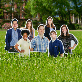 Cut outs of seven Georgia Tech graduates.