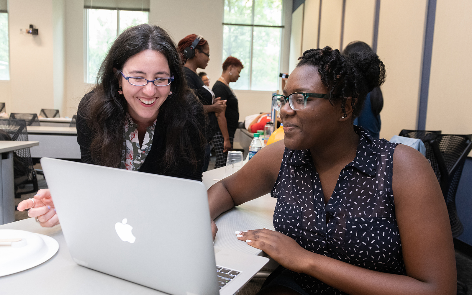 hernandez works with a student