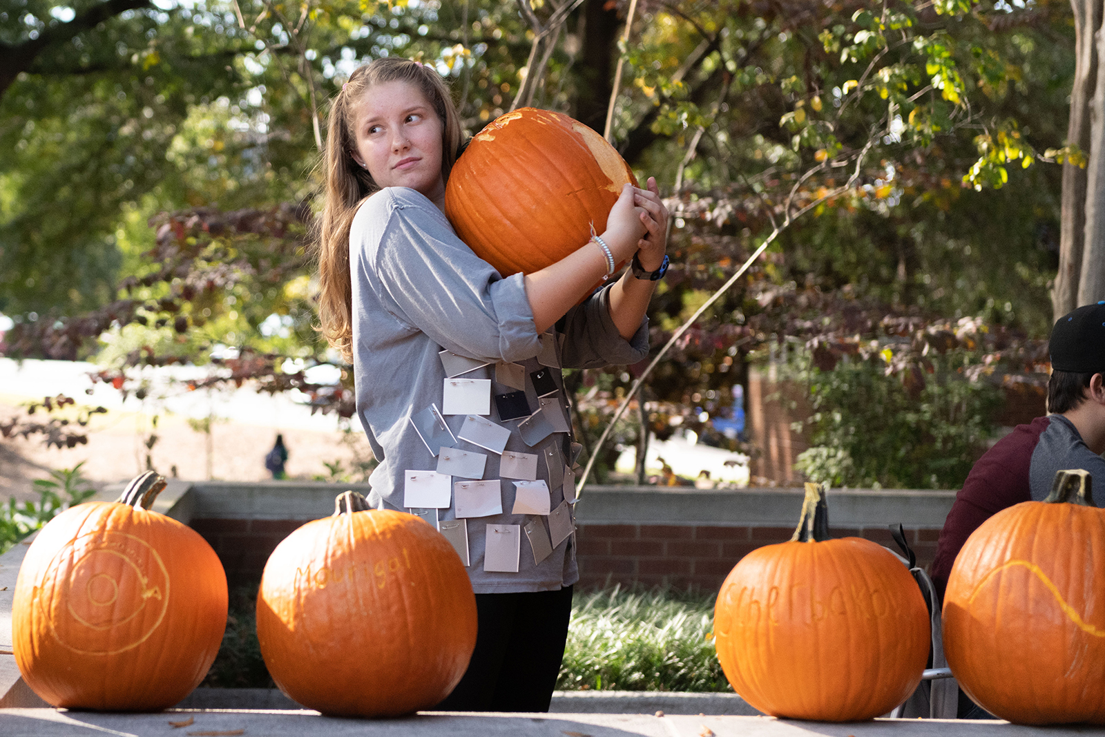 Lucy Grant with a pumpkin
