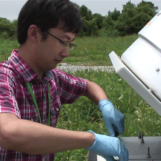 School of Earth and Atmospheric Sciences graduate student Hongyu Guo measures how atmospheric particles are interacting with sunlight.