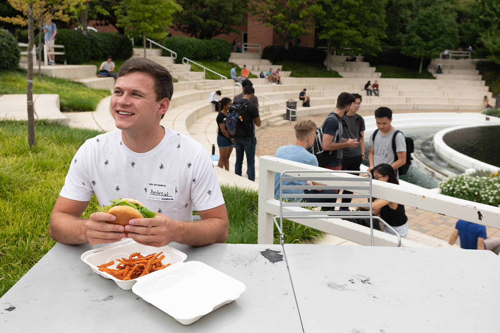 Andrew eats a burger