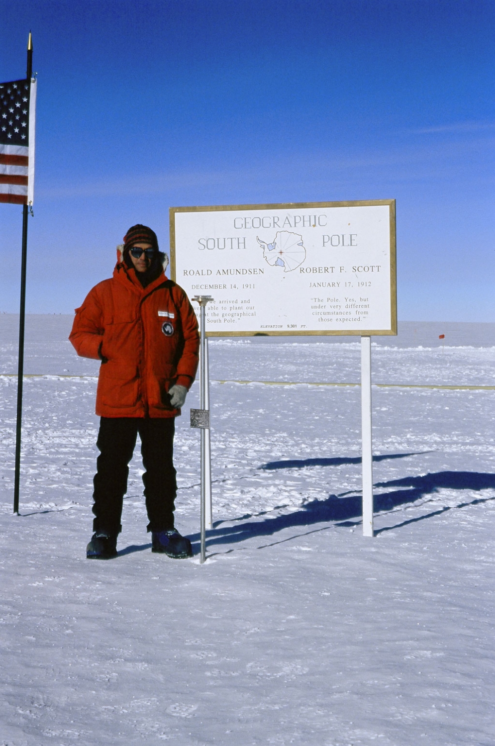 Georgia Tech Assistant Professor Ignacio Taboada poses at the geographic south pole of the earth.