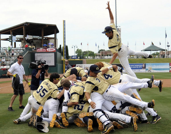 baseball team in a pile