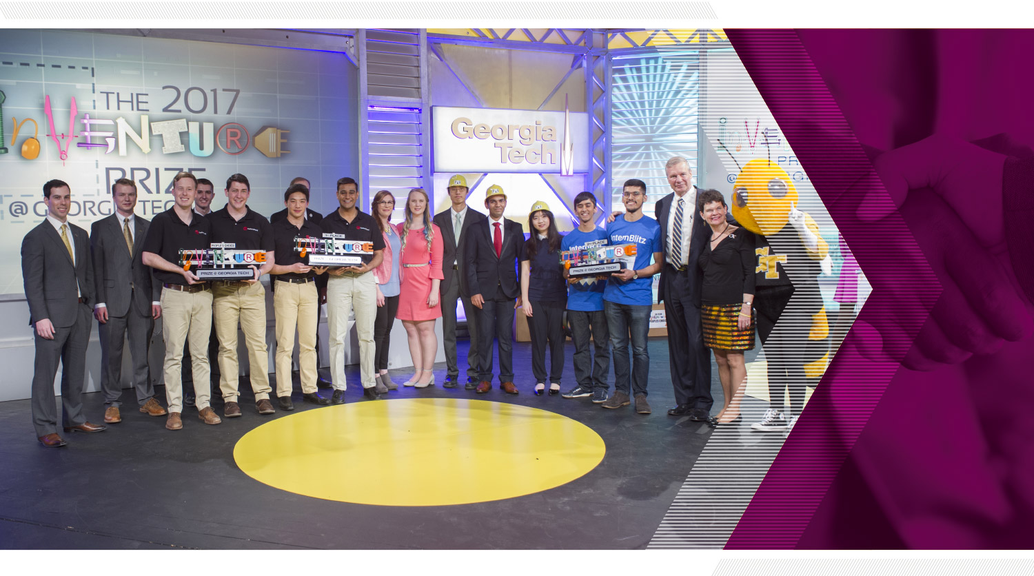 Winners of the 2017 InVenture competition posing on stage with President and Mrs. Peterson and Buzz.