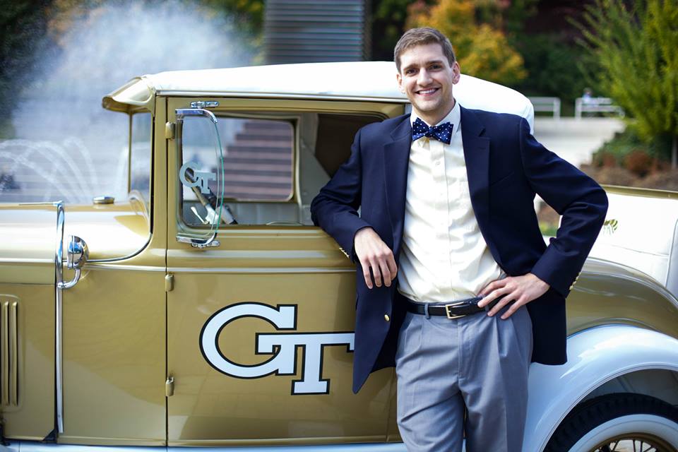 Portrait of Clark Howell standing in front of the Ramblin Wreck