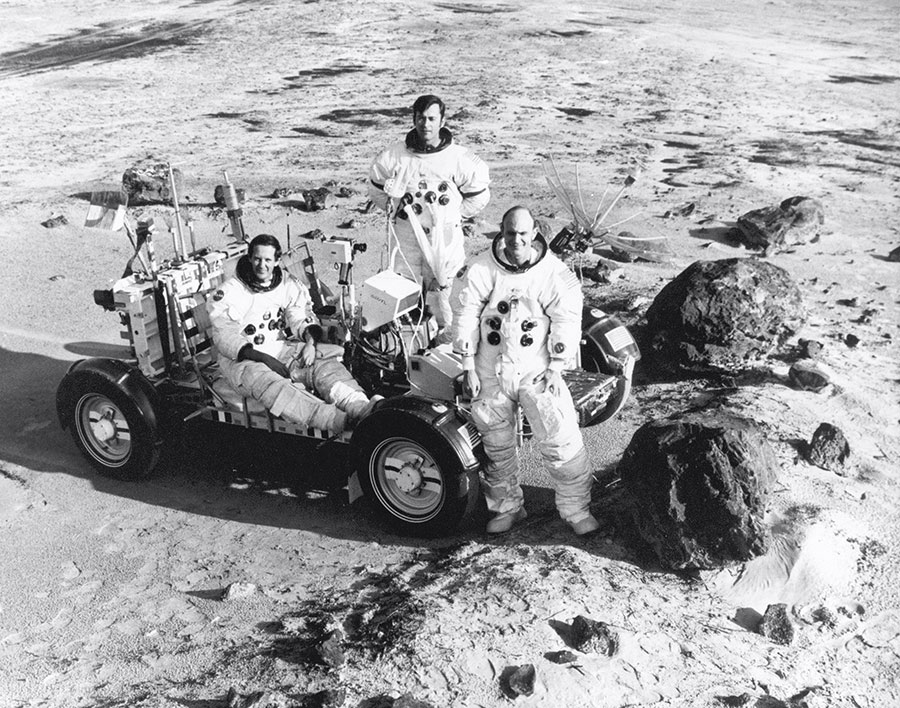 The crew of the Apollo 16 mission posed with the lunar rover