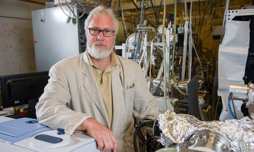 Professor Thomas Orlando surrounded by simulation devices