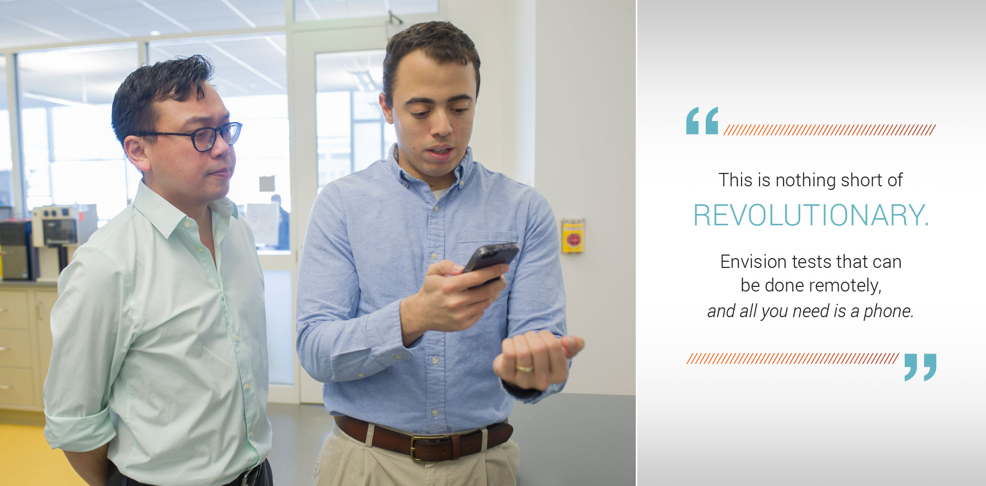 Dr. Lam and Rob Mannino in the lab where Rob works. Rob is demonstrating taking a photo of his fingernails like a patient would when using his app. Quote from Dr. Lam: "This is nothing short of revolutionary. Envision tests that can  be done remotely,  and all you need is a phone."